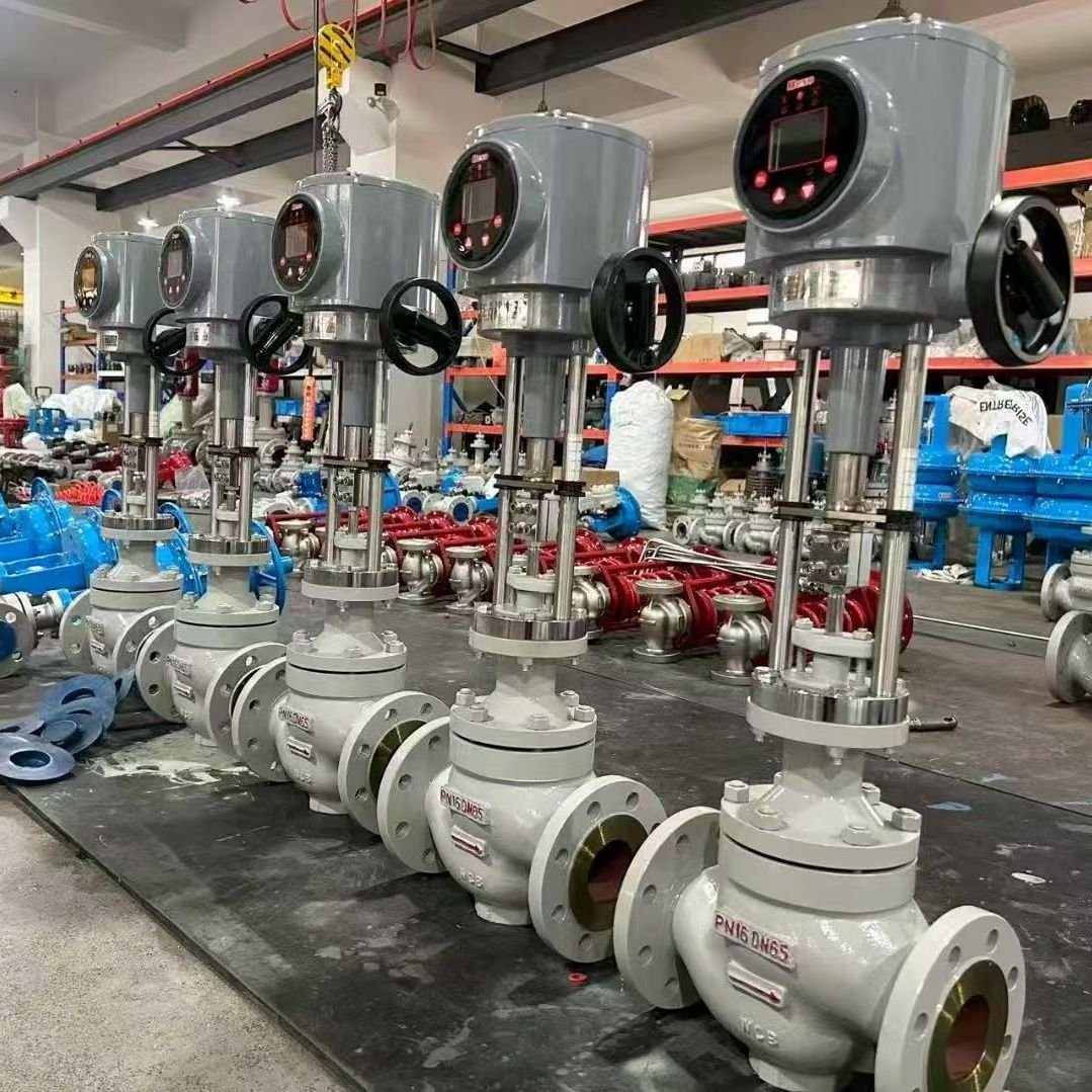 Electric actuator control valves with grey motor housings and handwheels