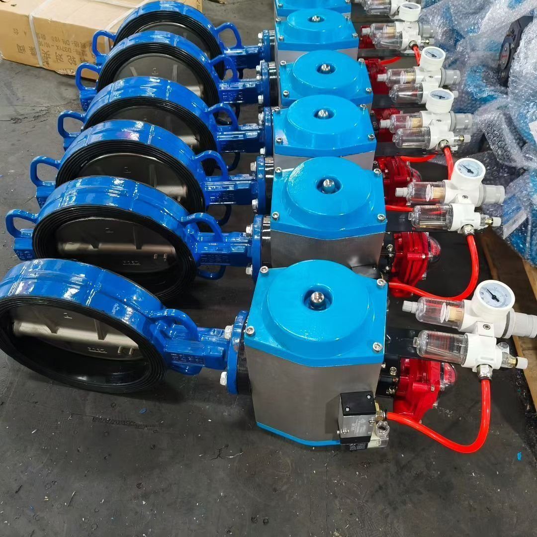 Pneumatic wafer butterfly valves with blue actuators in factory &ndash; Reguvale