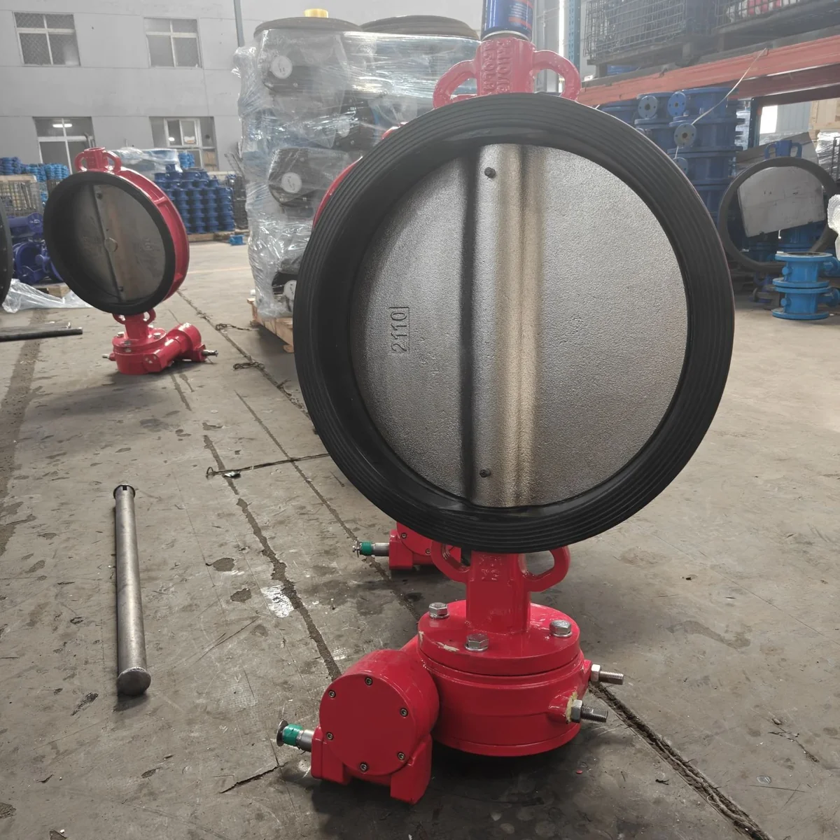 Red wafer butterfly valve with gear operator detail